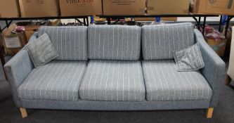 A 20th century Friis Danish three seater settee in blue striped fabric