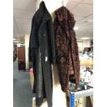 A vintage gent's woollen over coat and a faux fur coat