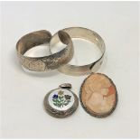 A group of silver jewellery, bangles,