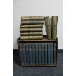 An early 20th century oak bookshelf containing twelve volumes "The Wonderful World of Knowledge"