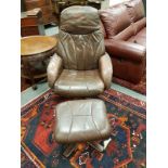 A brown leather swivel relaxer chair with stool, 77 cm width.