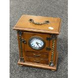 A jewellery box fitted with battery operated clock
