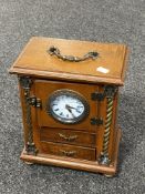 A jewellery box fitted with battery operated clock