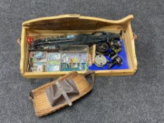 A pine twin handled fishing box containing creel, landing nets, vintage and later reels,