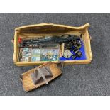 A pine twin handled fishing box containing creel, landing nets, vintage and later reels,