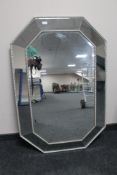 A contemporary all glass cushion mirror