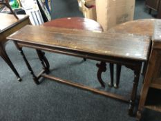 An Edwardian oak hall table