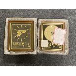 A boxed Tri-wall pack world wide clock/barometer