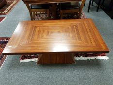 An Art Deco style coffee table 122 cm length