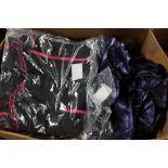 A box of pencil dresses and buckle vest tops