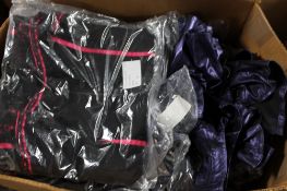 A box of pencil dresses and buckle vest tops