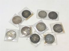 Assorted silver crowns,