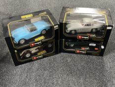 Four boxed Burago 1/18 scale die cast vehicles : Jaguar E Cabriolet, Lancier Spider,
