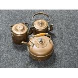 Three antique copper kettles