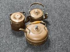 Three antique copper kettles
