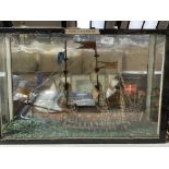 A 20th century display case containing a wooden galleon "The Royal Sovereign"