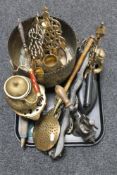 A tray of assorted brass ware, horse brasses on strap, vintage mincer,