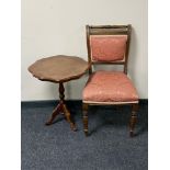 An antique mahogany dining chair and a wine table