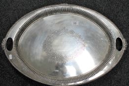 An early 20th century Walker & Hall twin handled silver plated serving tray