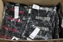 A box of Kamilla buckle tops