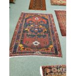 An antique Kurdish rug 146 cm x 210 cm