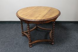 An early 20th century carved oak coffee table