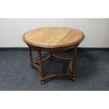 An early 20th century carved oak coffee table