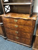 An antique mahogany and pine four drawer chest with brass drop handles