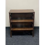 A set of 20th century mahogany open shelves