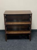 A set of 20th century mahogany open shelves