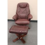 A brown leather relaxer armchair and stool