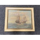 A painted framed oil on board - galleon in battle, by S.