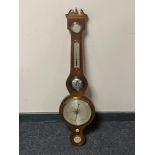 An antique mahogany cased barometer with silvered dial by D.