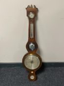 An antique mahogany cased barometer with silvered dial by D.