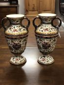 A pair of Zolnay vases, circa 1872, height 36 cm. (2) CONDITION REPORT: One restored.