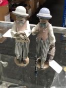 A Lladro figure, Jazz Horn 5832, together with Jazz Clarinet 5928, both boxed (two, a/f).