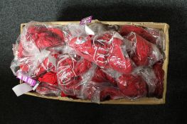 A box of Phaze red micro fibre crop tops