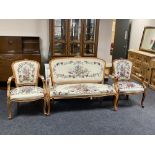 A beech framed three piece salon suite in tapestry fabric