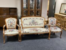 A beech framed three piece salon suite in tapestry fabric