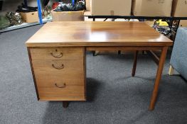 A mid 20th century Danish single pedestal desk CONDITION REPORT: Faded throughout