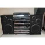 A five piece Aiwa stack system and a pair of speakers