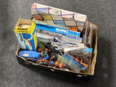 A box of mid 20th century and later toys : Hawk clockwork speed boat, plastic modelling kits,
