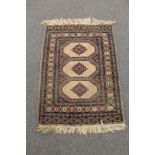 A fringed Persian rug