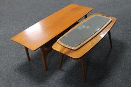 Two mid 20th century teak coffee tables and a mirror on teak board