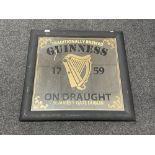 A Guinness advertising mirror