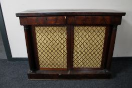 A Regency mahogany bookcase with pillar column supports