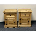 A pair of Mexican pine bedside cabinets