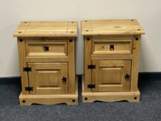 A pair of Mexican pine bedside cabinets