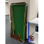 A 5' slate top snooker table and a Riley scoreboard, three cues, triangle,
