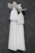 A Lladro figure of two nuns